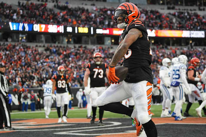 Bengals Joe Mixon (28) celebrates a touchdown during the Bengals vs. Colts game at Paycor Stadium on Sunday December 10, 2023. The game was tied 14-14 at halftime.